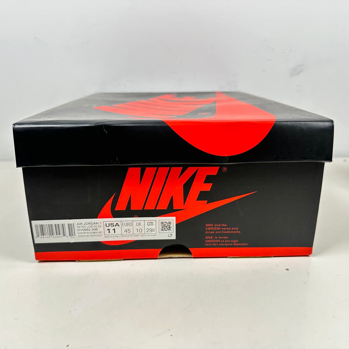 DV0982 006 Jordan 1 Low OG EX Negro Humo Gris