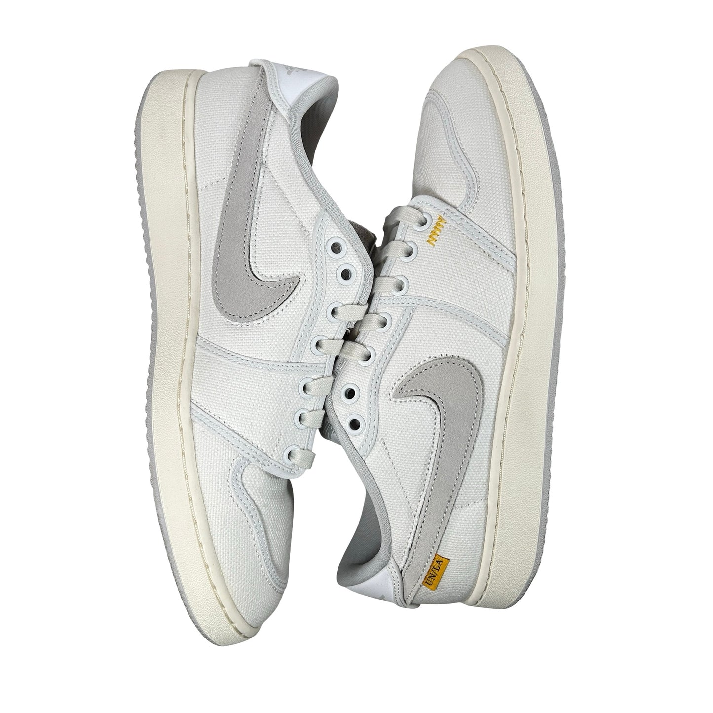 DO8912 101 Jordan 1 Retro AJKO Low SP Unión Lona Blanca