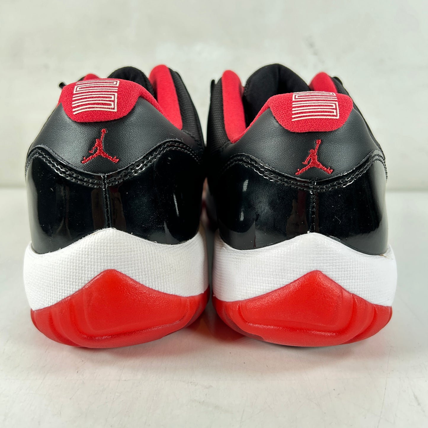 528895 012 Jordan 11 Retro Low Bred [CONDITIONAL] - 10.5 (Ink Stain On Left Foot)