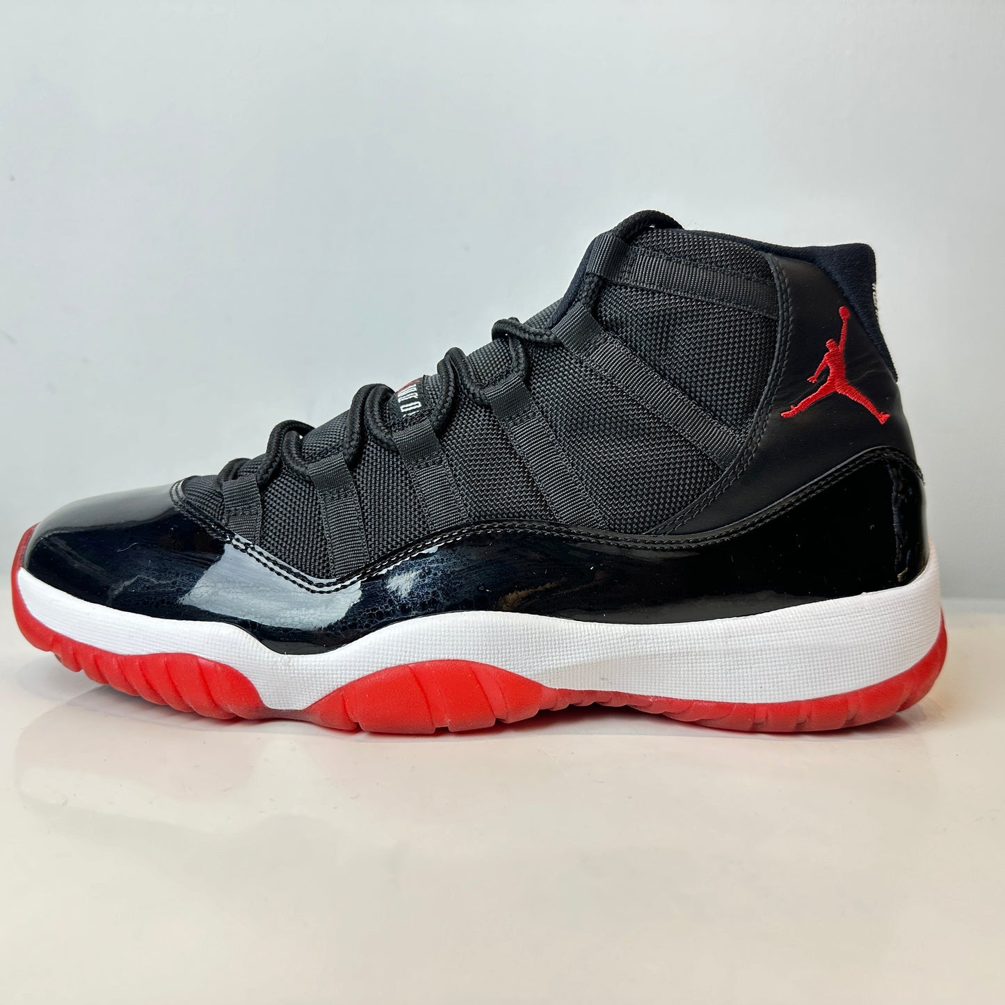 378037 010  Jordan 11 Retro Playoffs (2012) [USED] - 11 M (Used)