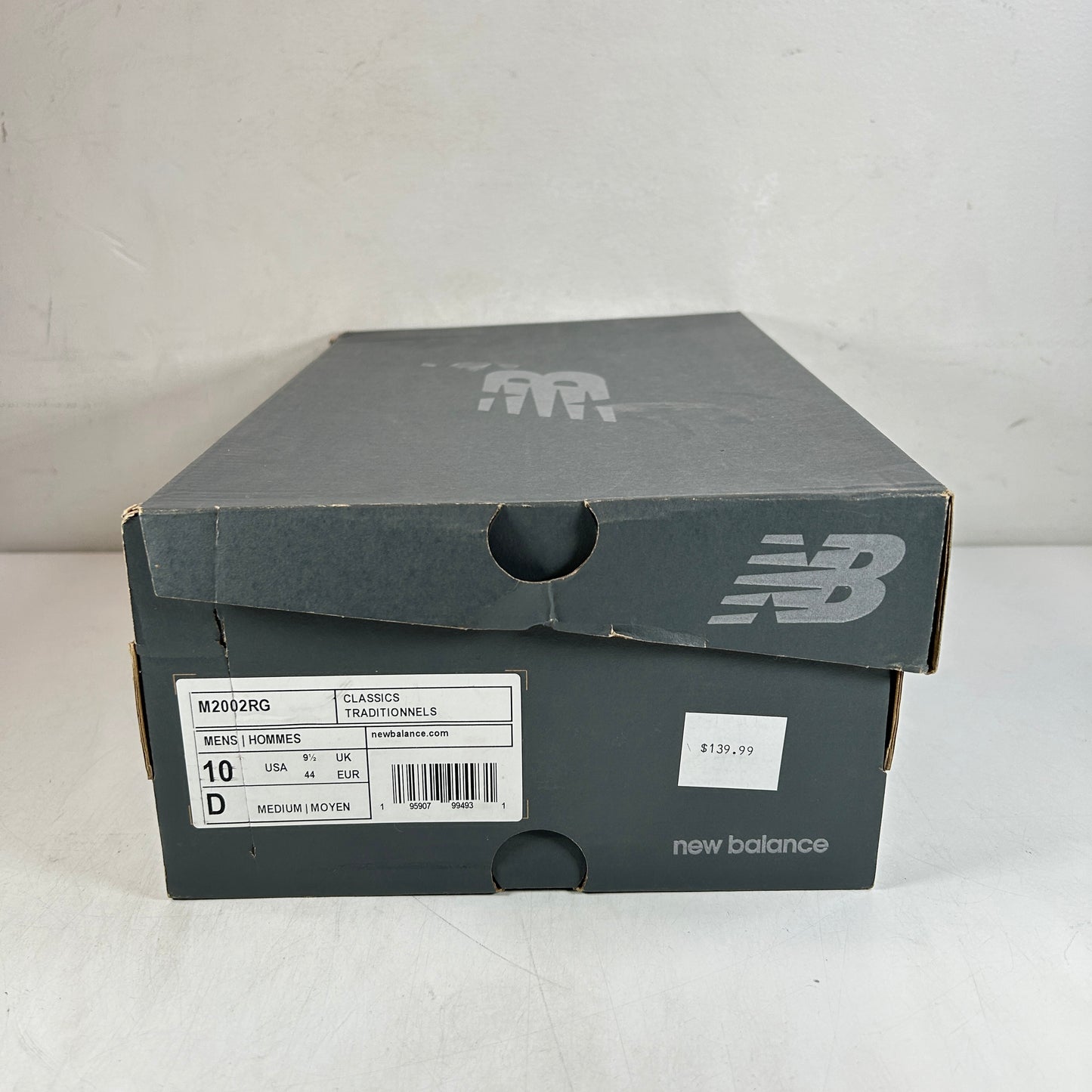 M2002RG New Balance 2002R Crema Claro Púrpura
