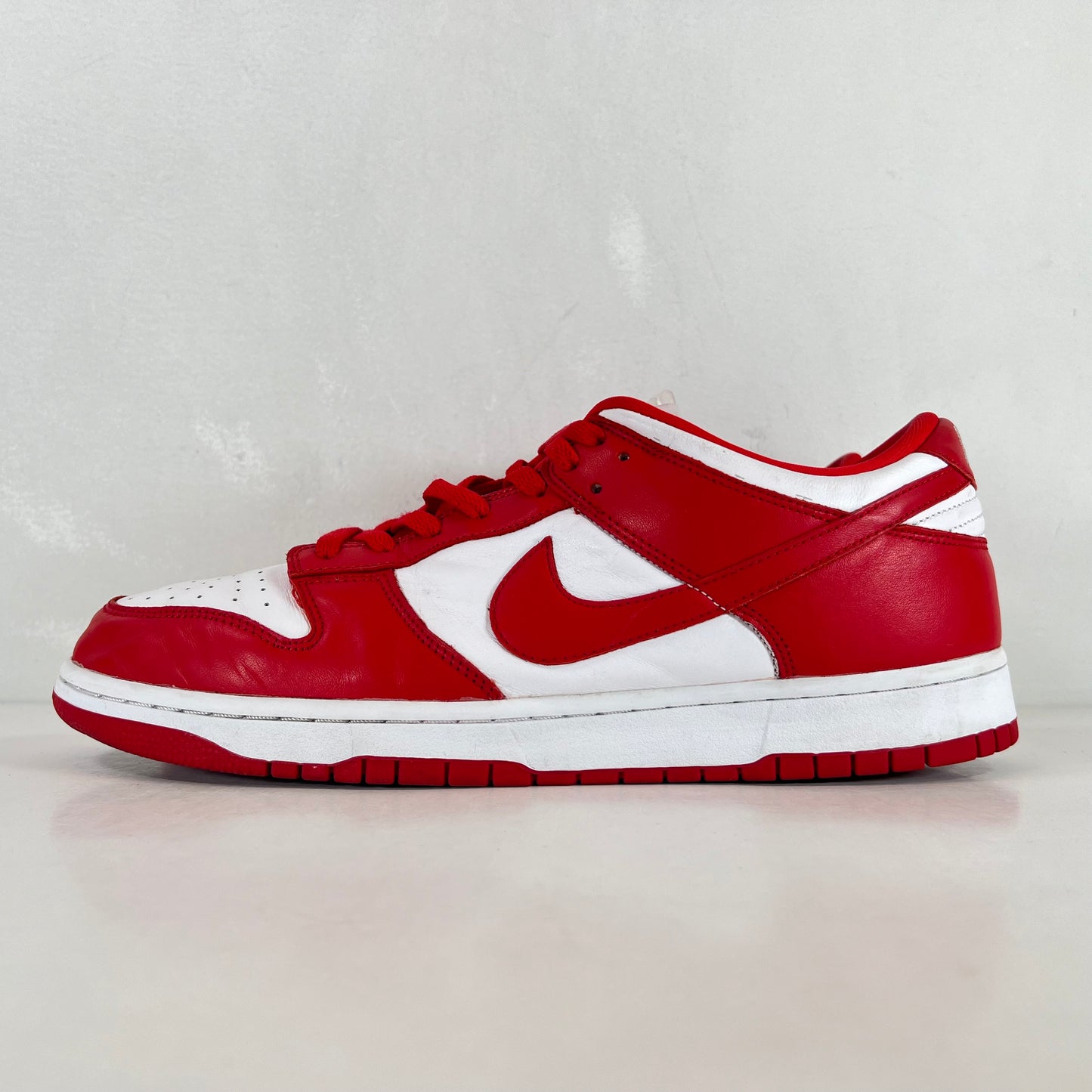 CU1727 100 Dunk Low Rojo Universitario