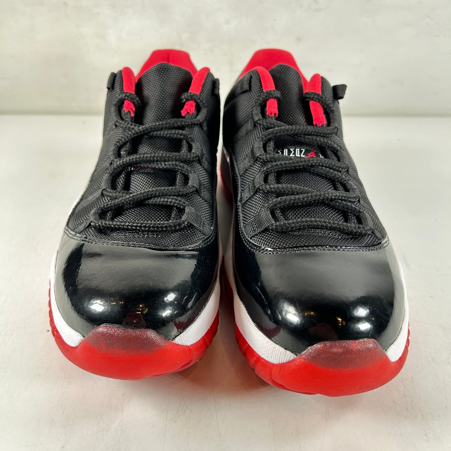 528895 012 Jordan 11 Retro Low Bred [CONDITIONAL] - 10.5 (Ink Stain On Left Foot)