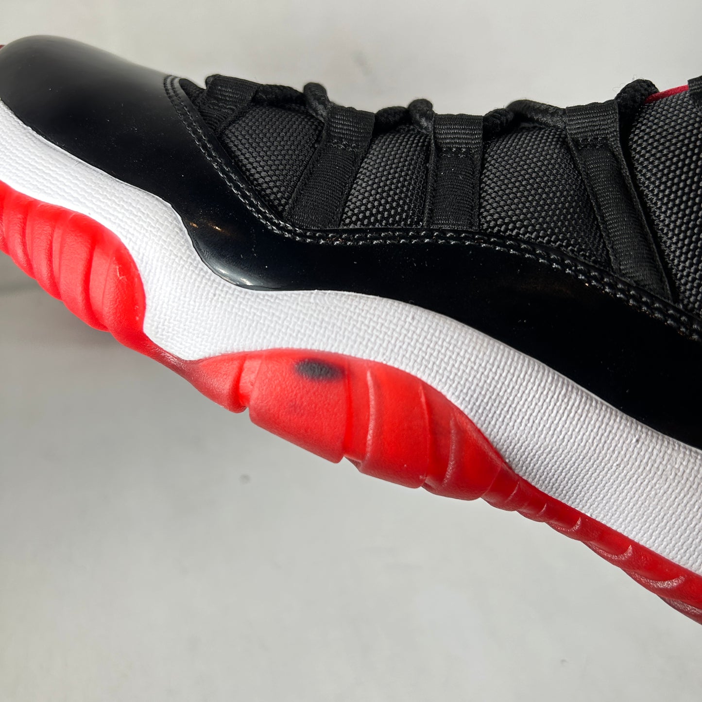 528895 012 Jordan 11 Retro Low Bred [CONDITIONAL] - 10.5 (Ink Stain On Left Foot)