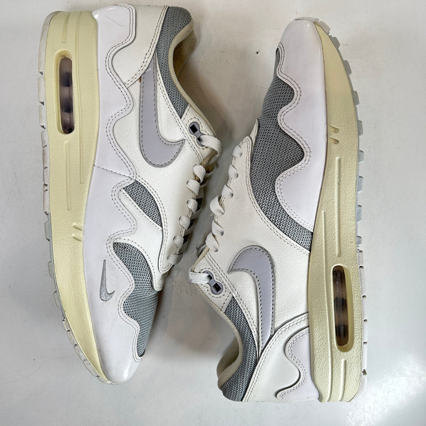 DQ0299 100 Nike Air Max 1 Patta Waves White [USED] - 9.5 M (Used)