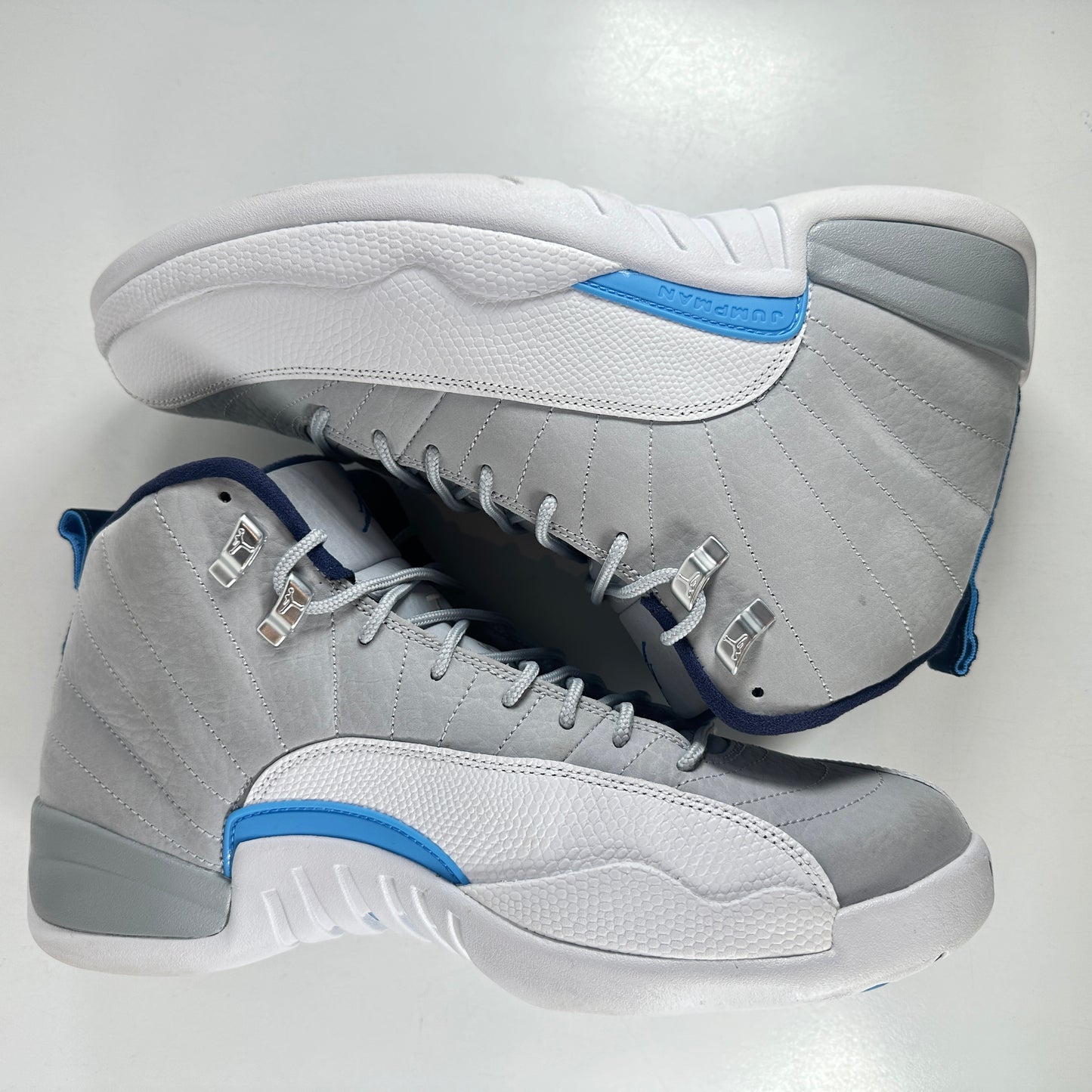 130690 007 Jordan 12 Retro Grey University Blue [USED] - 11 M (Used)