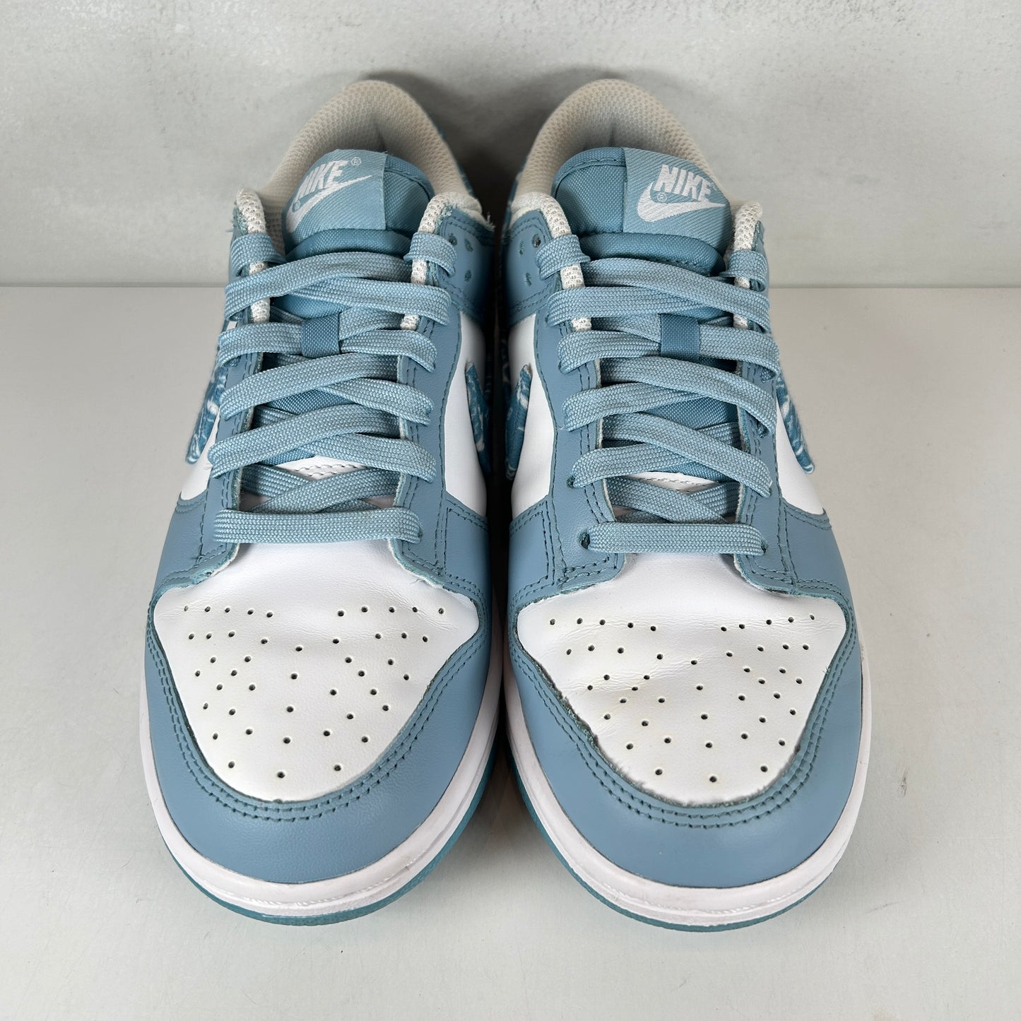 DH4401 101 Dunk Low Paisley Pack desgastado azul