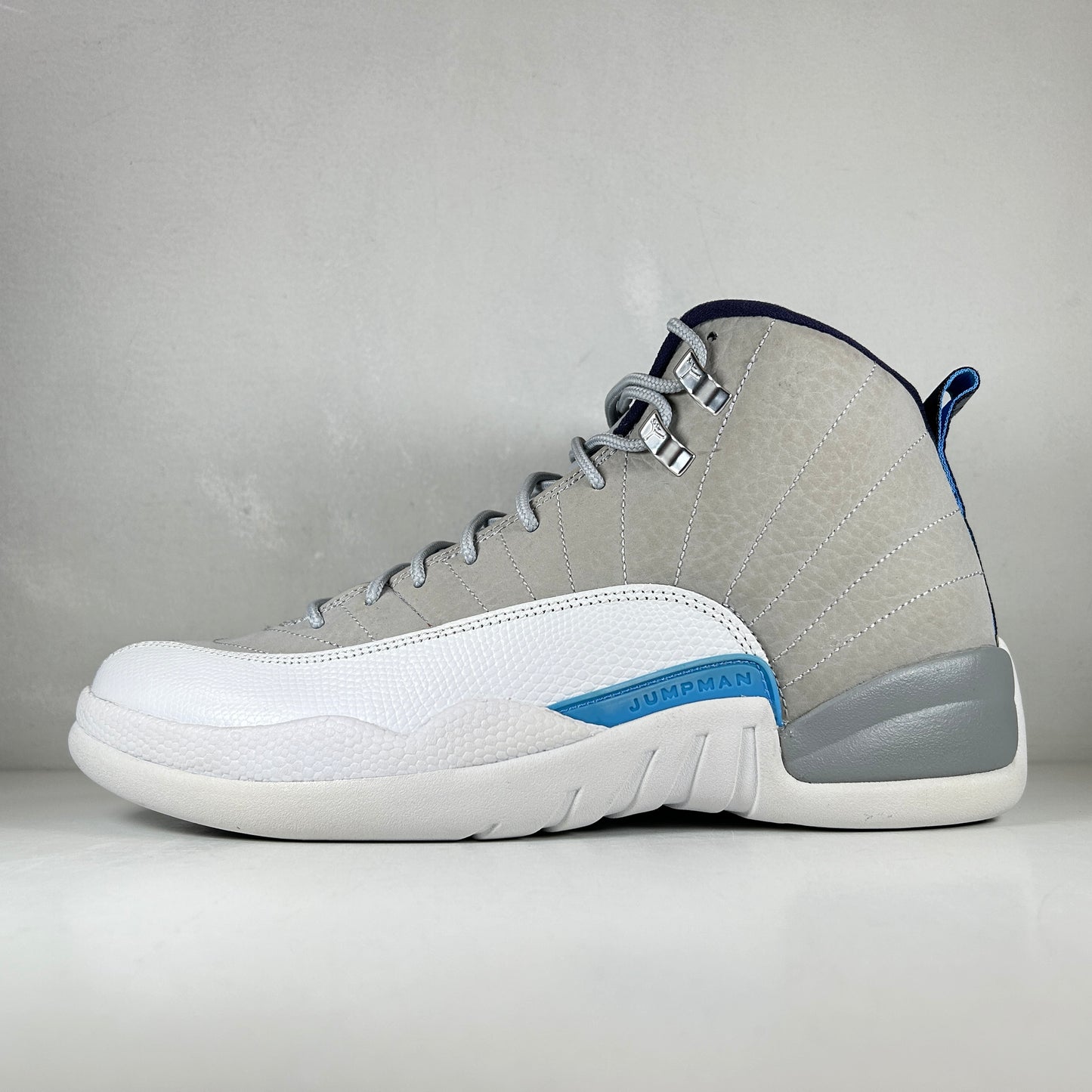 130690 007 Jordan 12 Retro Grey University Blue [CONDITIONAL] - 10 M (Scratch on Toe Box)