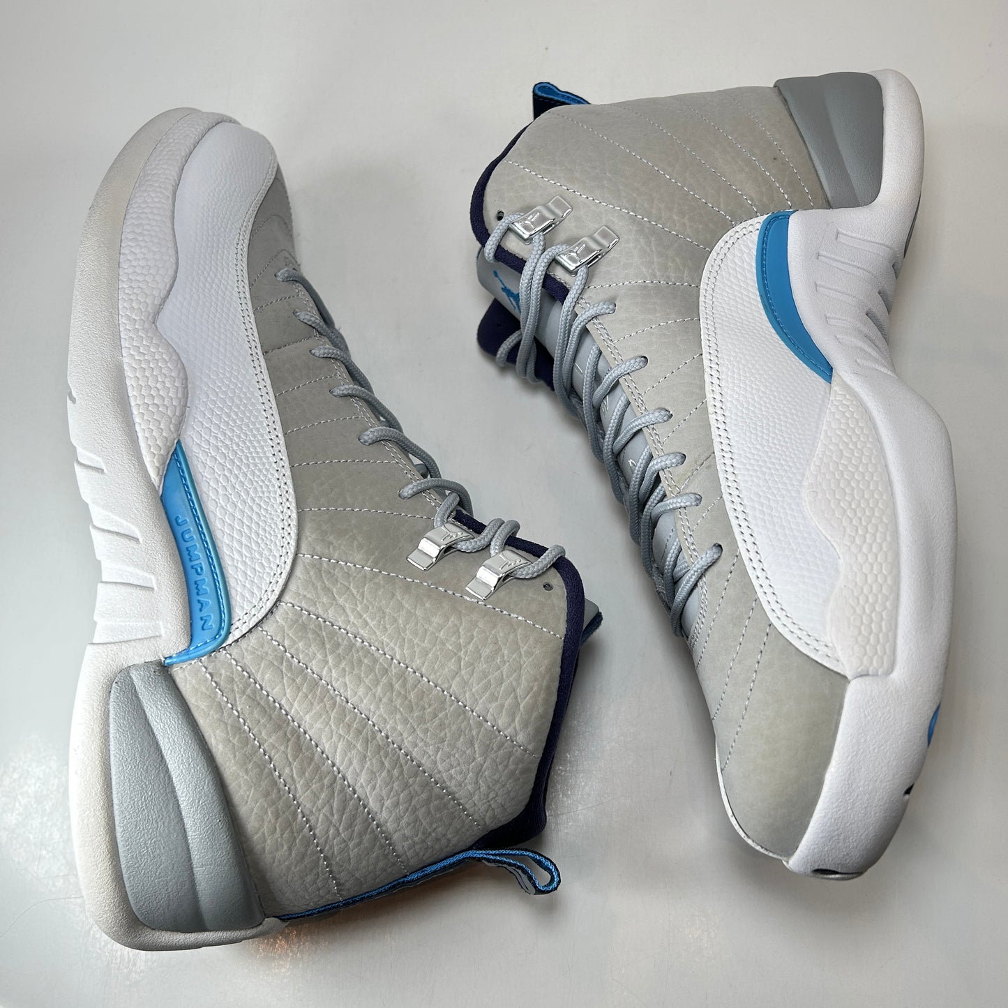 130690 007 Jordan 12 Retro Grey University Blue [CONDITIONAL] - 10 M (Scratch on Toe Box)